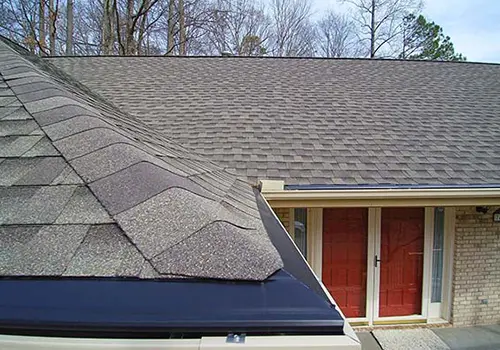 A roof that has been installed on the side of a house.